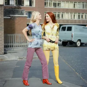 Tie-dye shirts worn by models, Jane (red hair) and Linda (blond hair). 3rd March 1970 Tie-dye shirts worn by models, Jane (red hair) and Linda (blond hair). 3rd March 1970