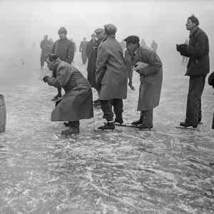 Timekeepers and officials at the finishing line of the speed skating circuit