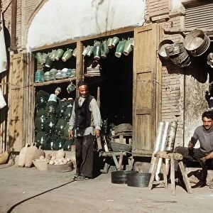 Tinsmith at work in Khoy village near Turkey Iran frontier North West Iran
