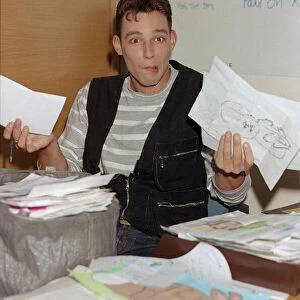 Toby Anstis opening mail at The BBC in the Childrens BBC studio. 8th October 1993