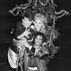 Tom Bailey, Alaanah Currie and Josh Leeway who form British pop group The Thompson Twins