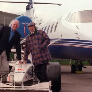 Tom Hunter with Jackie Stewart March 1999 with a race car with the new Lear Jet Tom Hunter with Jackie Stewart March 1999 with a race car with the new Lear Jet
