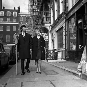 Tom Jones pop star and his wife Lyn Jones in London March 1965 do some house