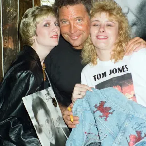 Tom Jones poses with fans Kathy Hall and Rosina Sims at HMV Oxford Street Tom Jones poses with fans Kathy Hall and Rosina Sims at HMV Oxford Street