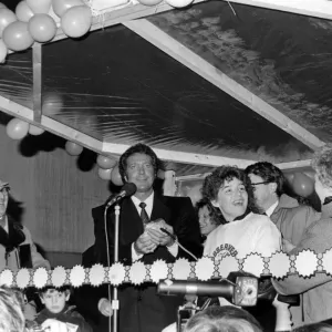 Tom Jones turns on the Christmas lights in his hometown of Pontypridd, Wales