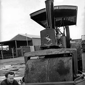 Tom Weatherell with his vintage 10-ton steam roller Resolution on 26th March 1978