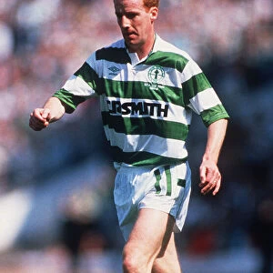 Tommy Burns running with ball January 1990