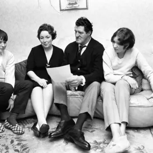Tommy Cooper, pictured at home with family, wife Gwen, son Thomas and daughter Vicky