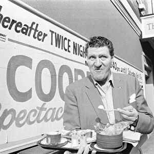 Tommy Cooper seen here having breakfast outside The New Theatre, Oxford