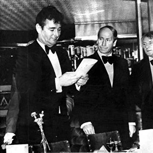 Tommy Docherty (R) at a boxing match in a Manchester nightclub where Bobby Charlton acts