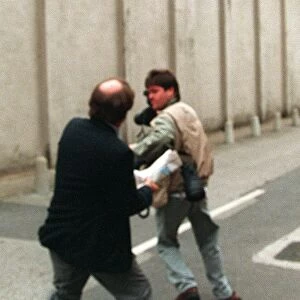 Tommy Gallagher, the father of Liam and Noel of Oasis, attacks Sun photographer Jim Clark