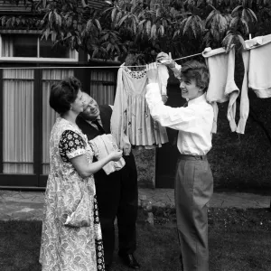 Tommy Steele and his parents at his new &pound;5000 house in Catford, London