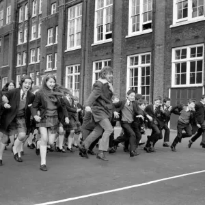Black and white print of Tommy Steele at Bacons School