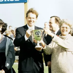 Tony Blair MP leader of the Labour Party holding a trophy Tony Blair MP leader of the Labour Party holding a trophy