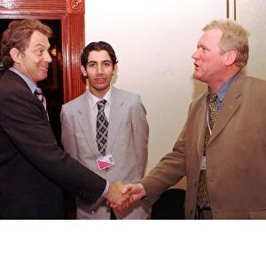 Tony Blair shakes hands with Bob Shields as Alan Cheyne looks on October 1998 Labour