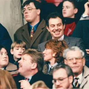 Tony Blair (smiling, above the red haired lady) in the crowd at Anfield