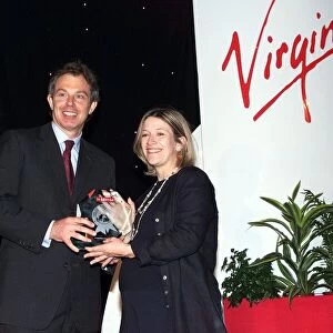 Tony Blair and teacher of the year, Helen Ridding at the Dorchester Hotel for the Mirror