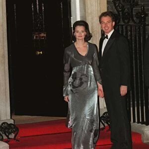 Tony Blair and his wife Cherie Blair outside number Ten Downing Street on their way to