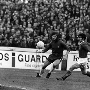 Tony Dunne Manchester United beats Alan Hudson Jan 1971 to the ball during match