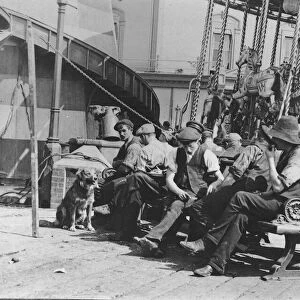 Torquay regatta Fairground workers take a break. Circa 1910