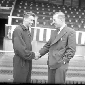 Torquay United manager Eric Webber (right) bidding farewell to Peter Wakeham on hs Torquay United manager Eric Webber (right) bidding farewell to Peter Wakeham on hs