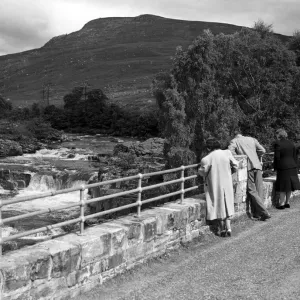 Torrandhu Bridge with the falls of glascarnoch river in Ross and Cromarty Torrandhu Bridge with the falls of glascarnoch river in Ross and Cromarty