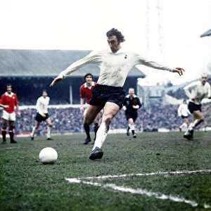 Tottenham Hostpur football player Martin Chivers shoots at goal in a match against