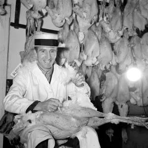 Cliff Jones in a Butchers Shop Print, December 1962 Cliff Jones in a Butchers Shop Print, December 1962