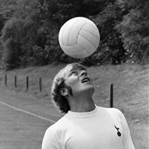 Tottenham Hotspur footballer Ralph Coates practices his heading skills during the Spurs