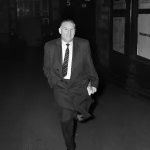 Tottenham Hotspur manager Bill Nicholson hurries out of Preston Station as he tries to Tottenham Hotspur manager Bill Nicholson hurries out of Preston Station as he tries to