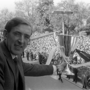 Tottenham Hotspur player Danny Blanchflower holding the European Cup Winners Cup Winners