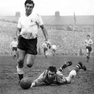 Tottenham Hotspur striker Bobby Smith in action against Sheffield Wednesday
