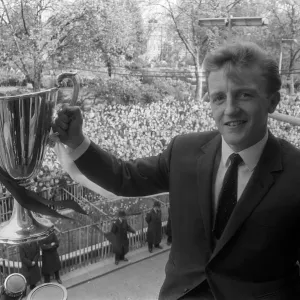 Tottenham Hotspurs Terry Dyson holding the European Cup Winners Cup Winners trophy