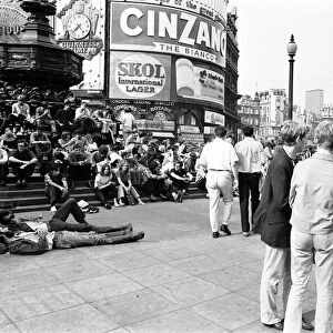 Tourists in Piccadilly, London, 10th August 1969