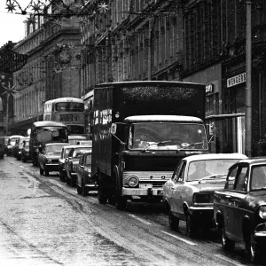 Traffic struggles against the snow on Grainger Street, Newcastle 23 November 1971