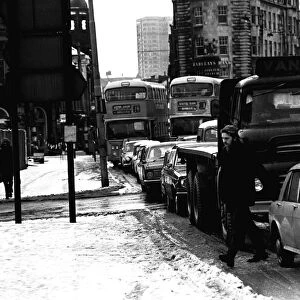 Traffic struggles against the snow on Westgate Road, Newcastle 23 November 1971