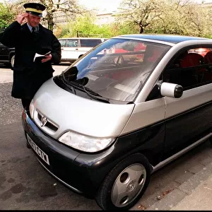 Traffic Warden Jim Adams confused with Vauxhall Maxx silver black prototype urban car