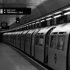A train standing at the platform of Heathrow Airports terminal four tube station