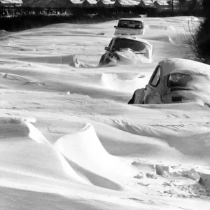 Trapped: These vehicles are only half-mile from the South Warwickshire village of Long Trapped: These vehicles are only half-mile from the South Warwickshire village of Long