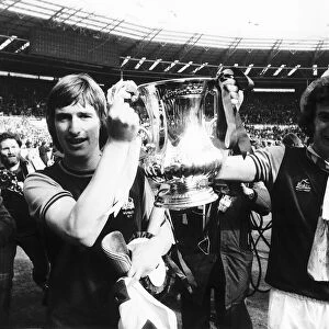 Trevor Brooking right and Kevin Locke hold the FA Cup Mafter beating Fulham in the FA