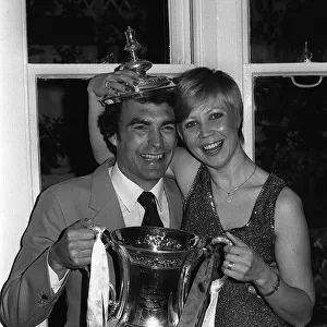 Trevor Brooking with his wife holding the FA Cup at the reception for the West Ham team