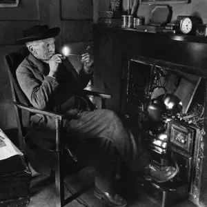 Trinity Hospital foundation. Mr. H South lights his pipe in preparation for a Trinity Hospital foundation. Mr. H South lights his pipe in preparation for a