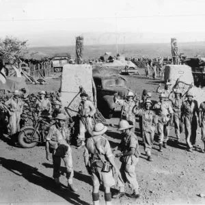 Triumphant South African troops coming through the entrance to Hobok Fort in Abyssinia a Triumphant South African troops coming through the entrance to Hobok Fort in Abyssinia a