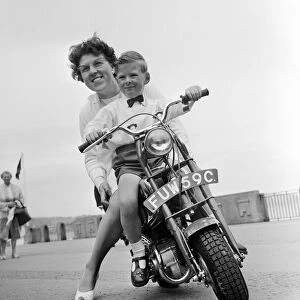 TT race fans at a mini-bike presentation on the Isle of Man. 29th June 1965
