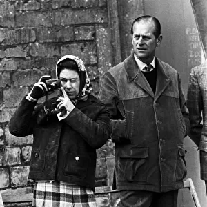 Tthe Queen with Prince Philip, taking picture at Badminton Horse Trials