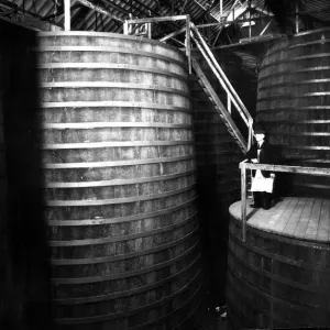 The Tun Room containing oak vats with Brewery Foreman Dan Rodway, 1930 s The Tun Room containing oak vats with Brewery Foreman Dan Rodway, 1930 s