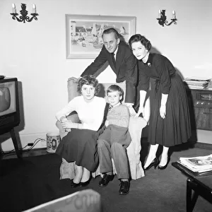 Tv presenter Hughie Green seen here at home with his family. 4th December 1957