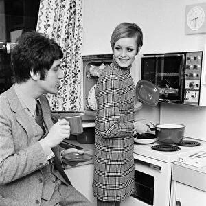 Twiggy with her manager, Justin de Villeneuve in one of the stands at the Ideal Home
