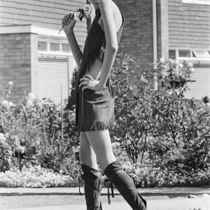 Twiggy, (real name Lesley Hornby) English model, seen in a Hippie gear outfit Twiggy, (real name Lesley Hornby) English model, seen in a Hippie gear outfit