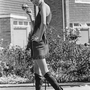 Twiggy, (real name Lesley Hornby) English model, seen in a Hippie gear outfit Twiggy, (real name Lesley Hornby) English model, seen in a Hippie gear outfit